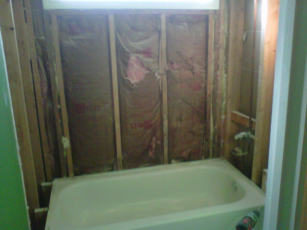 The durock is taken out of the wall down to the framed studs